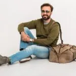 Hansome Bearded Stylish Man Sitting On Floor U8C62KR 1 150x150