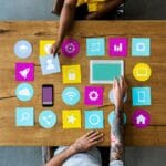 Group Of Computer Icon On The Wooden Table P77YUSB 150x150