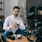 Smiling Technology Blogger Putting On New Smart Wa 54TFW25 150x150