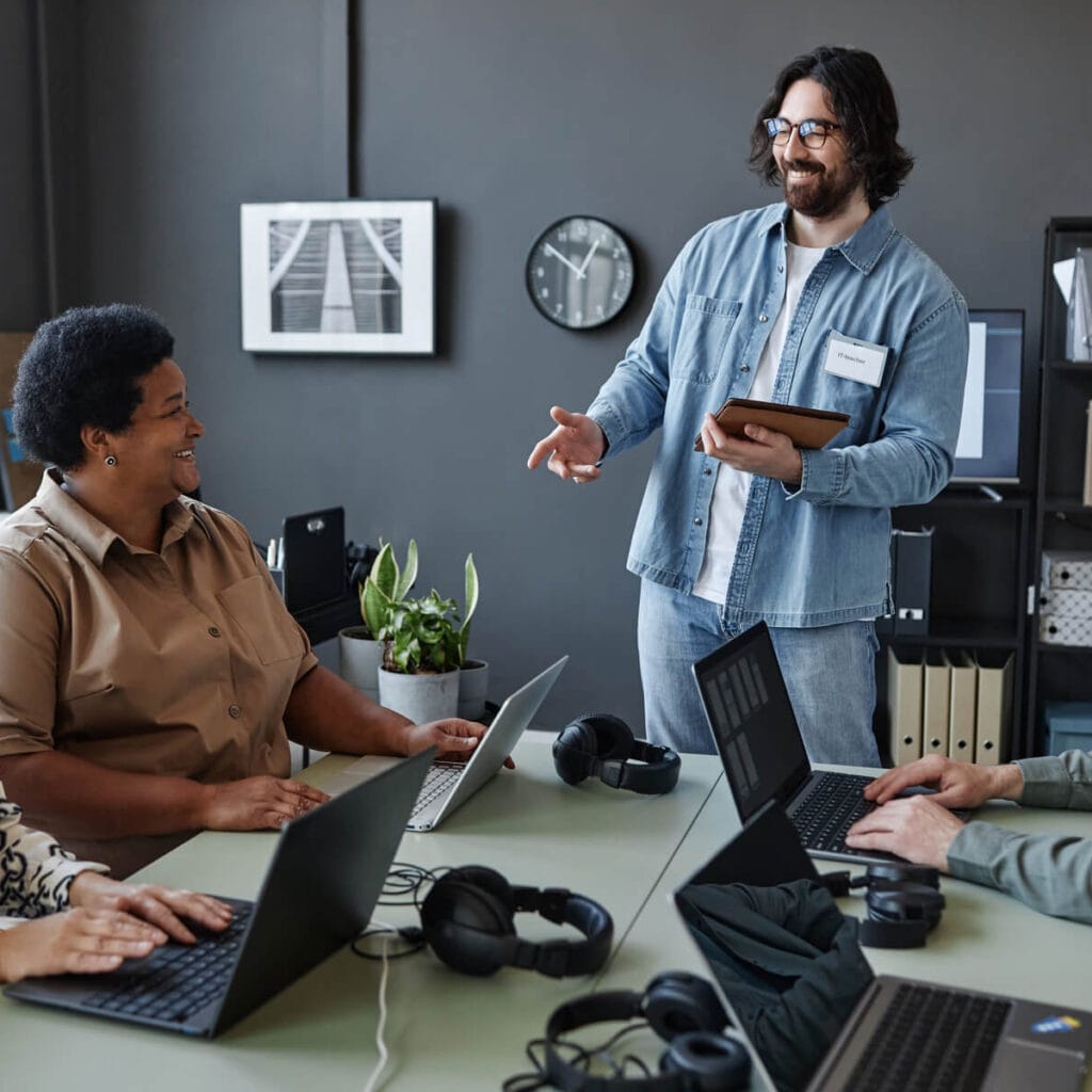 Bearded Young Man Leading Computer Class For Senio 2023 11 27 05 30 10 Utc 2 1 1024x1024