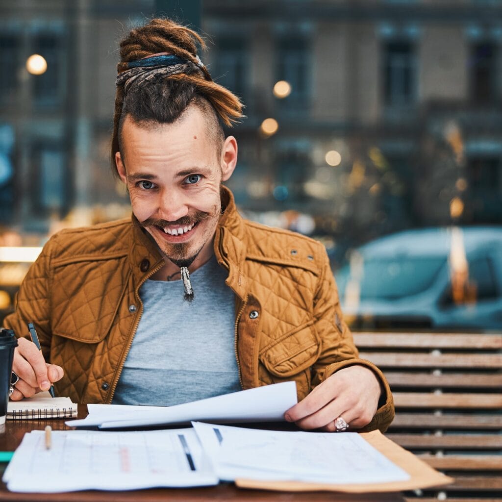 Cheerful Hipster With Sketchbook In Urban Cafe 6YZVMKW 1024x1024