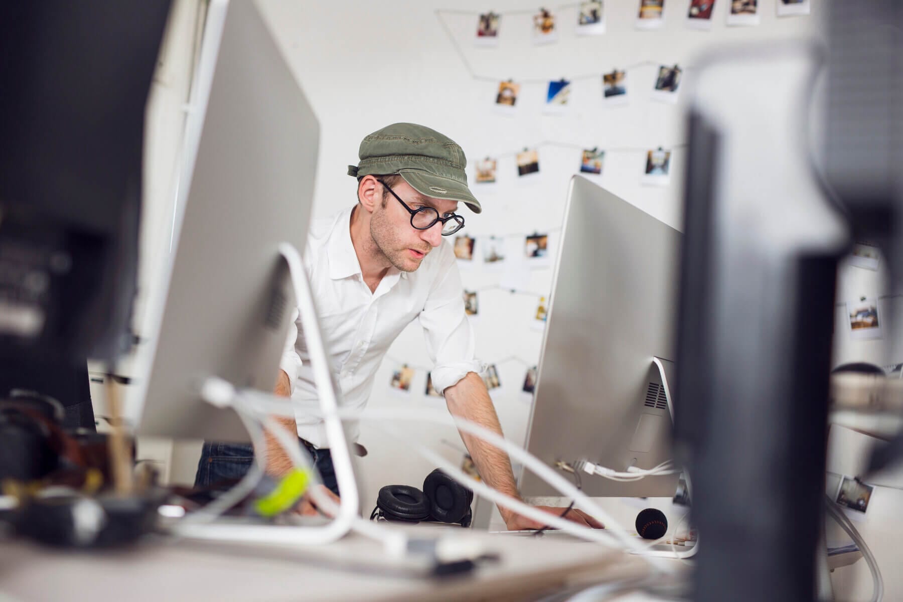 Focused Photographer Editing Photos On A Computer 2024 07 08 21 20 31 Utc