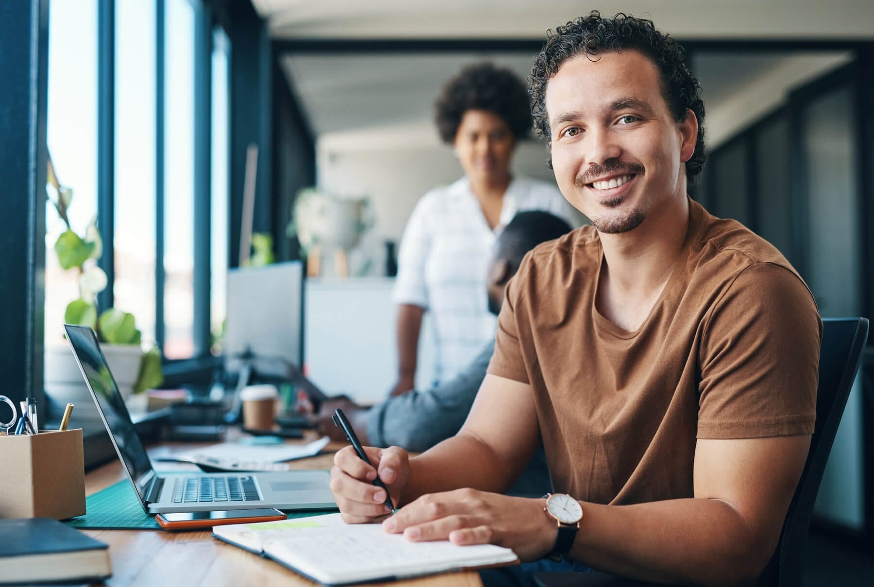 Shot Of A Young Businessman Writing In A Notebook 2023 11 27 04 53 36 Utc